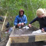 CAS Board Member, Warren McMaster III sifting for finds with UoB student, Leanne Bayliss.