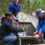 Lead graduate student, Louisa Pittman and CAS Board Member, Scott Dawson sifting for finds with CAS Volunteers.