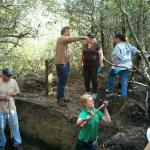 Prof Mark Horton giving Board Member, Rauna Conner a tour of the dig site.