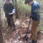 Two UoB students augering... scoping out the site for the next trench.