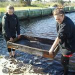 Wet Sieving.  2 UoB students further sifting the spoil soil for smaller artifacts.