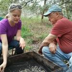 Board Member, Maggie Dawson sifting for smaller finds with CAS Member, Bruce Clark.